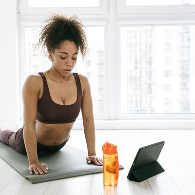 Close up of yoga mat and water bottle